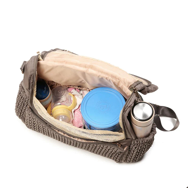 Front view of a gray waterproof mommy backpack with insulated baby bottle bags