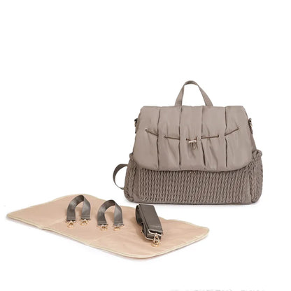 Detail of the included baby bottle bag trio, insulated for temperature control
