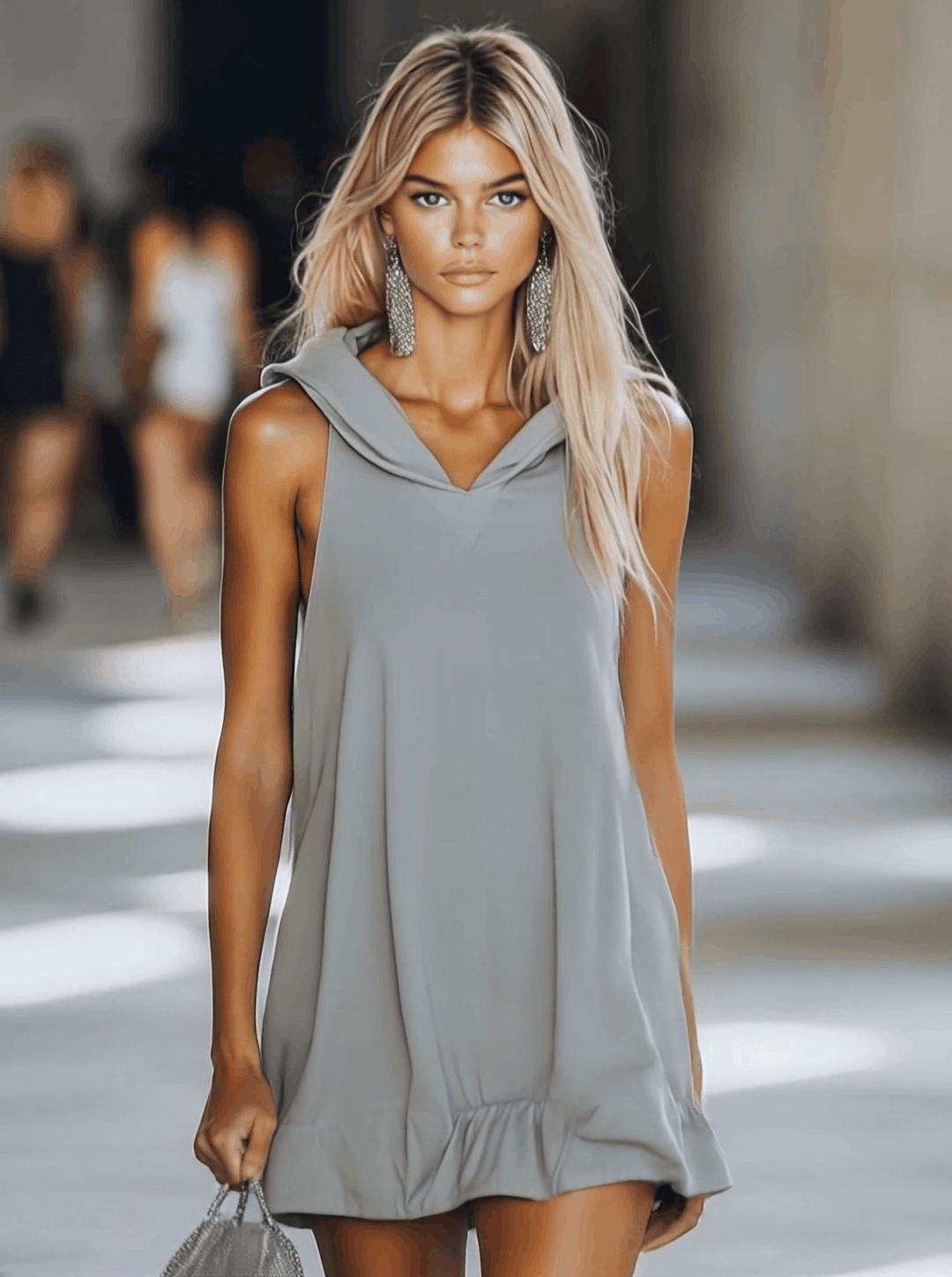 Comfortable gray sleeveless hooded swing mini dress for women, versatile for beach cover-up or casual wear.