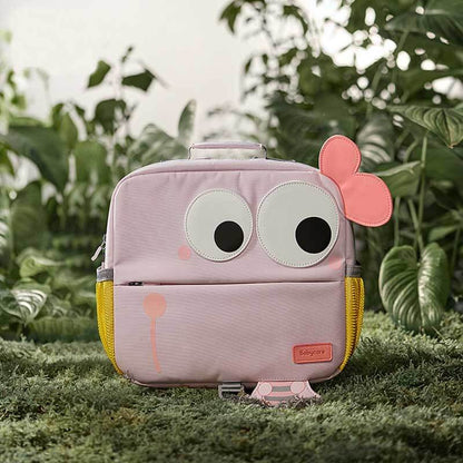 Happy child wearing a pink lightweight canvas school backpack, ready for kindergarten