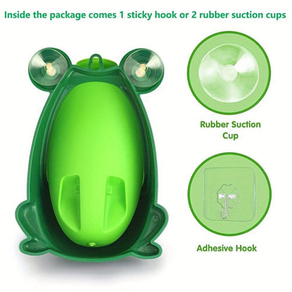 Toddler boy learning to use a frog shaped potty training urinal with spinning target