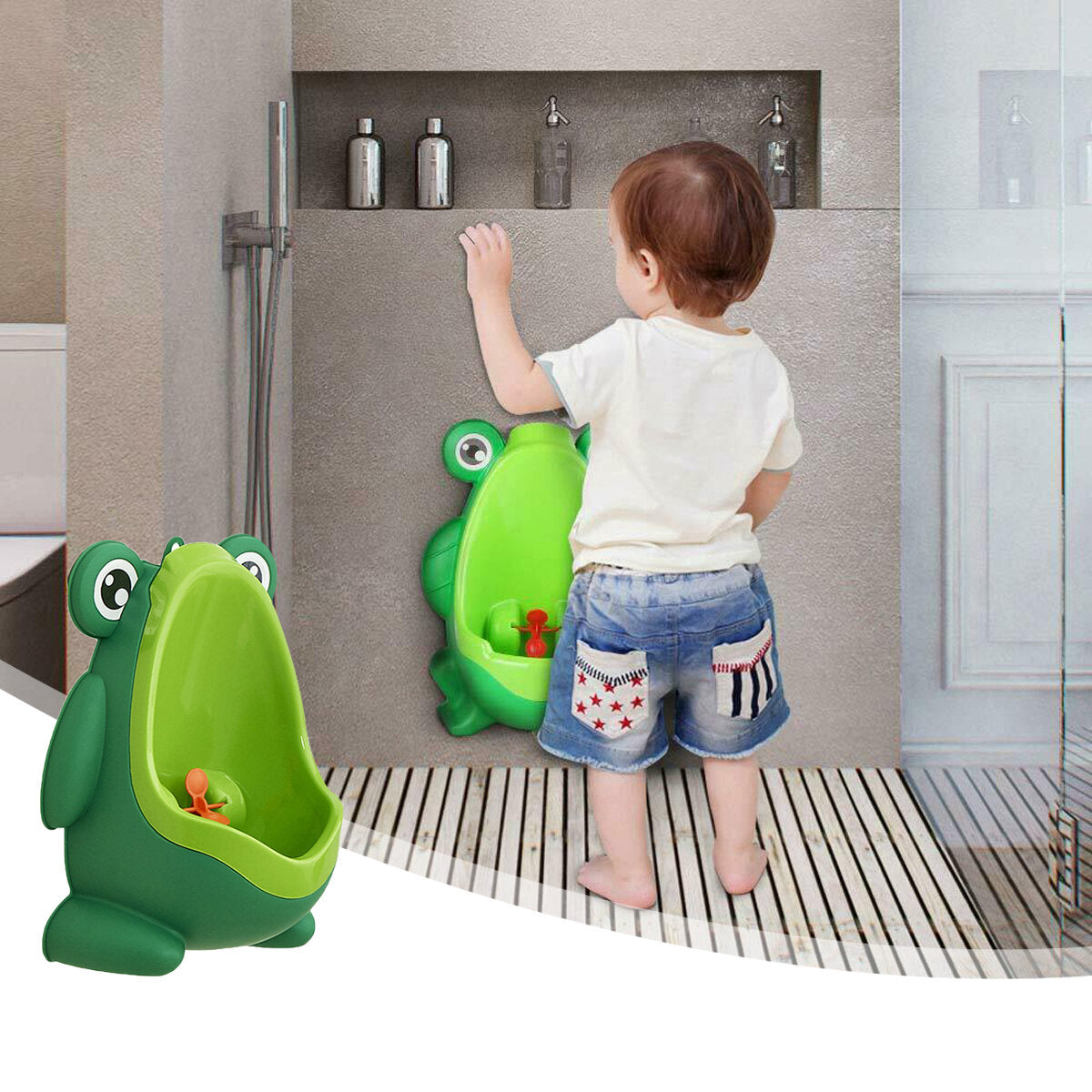 Green frog potty training urinal for boys with a fun spinning target, wall-mounted for toddlers
