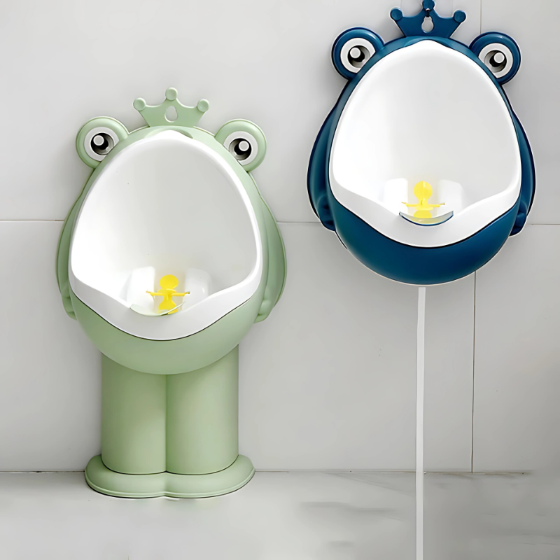 Green frog-shaped potty training urinal for boys, perfect for toddlers and kids' bathroom hygiene.