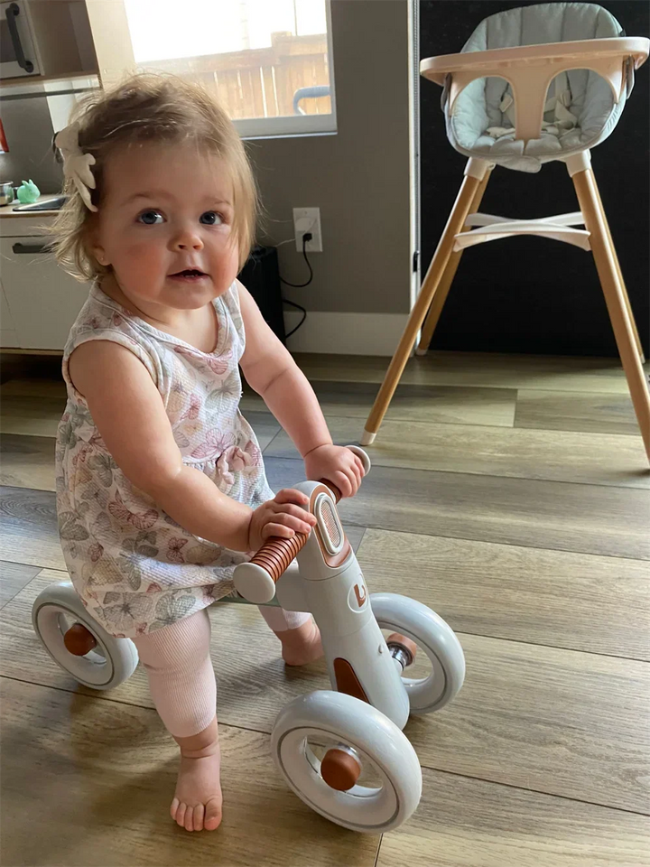 Safe & stable toddler balance bike for 12-24 months. Green, with silent wheels & ergonomic design.