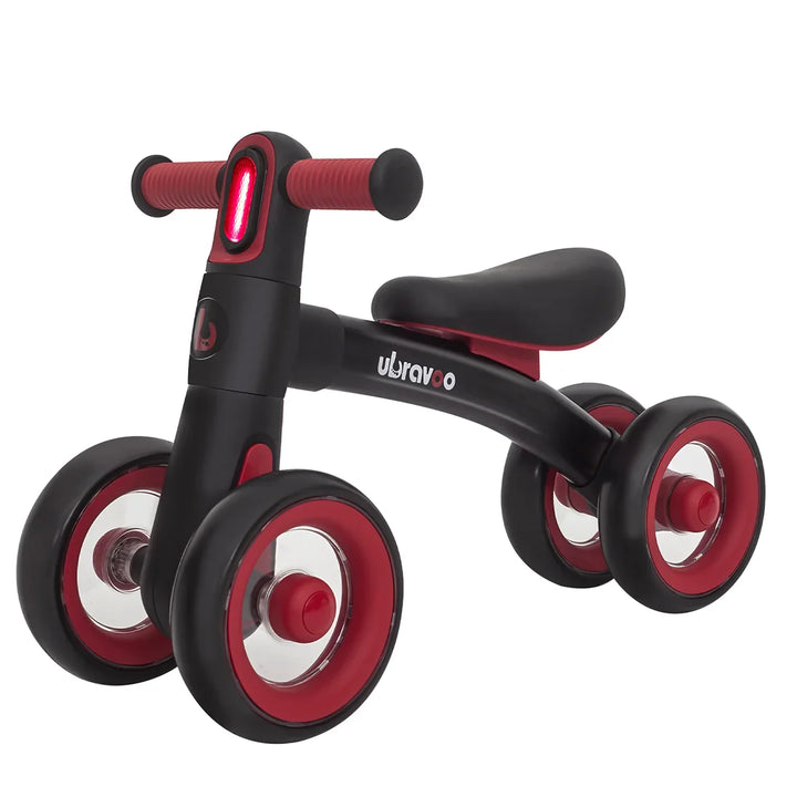 Durable green-geey no-pedal balance bike for 1-2 year olds. A learning ride-on toy with headlight & quiet wheels.
