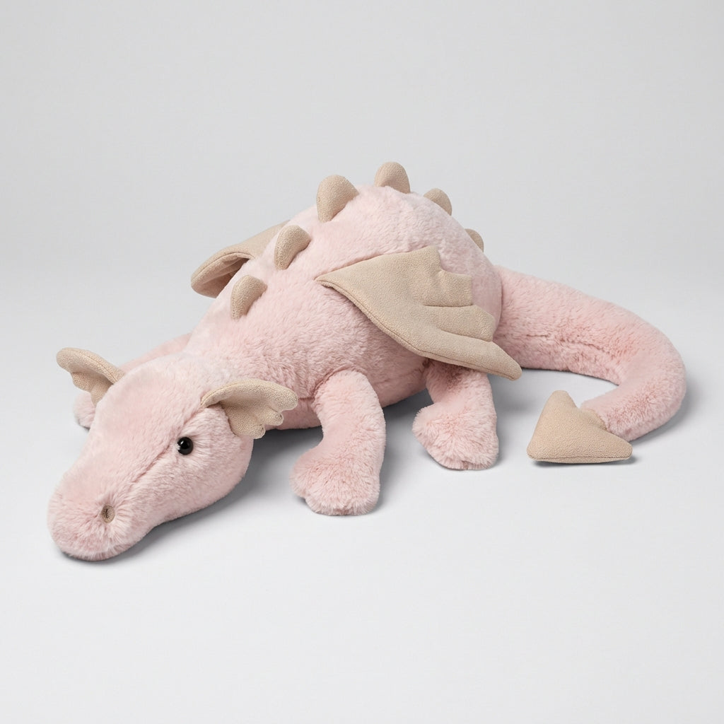 White plush dragon stuffed animal for children, a soft cuddly toy encouraging imaginative fantasy play. Perfect kids comfort gift.
