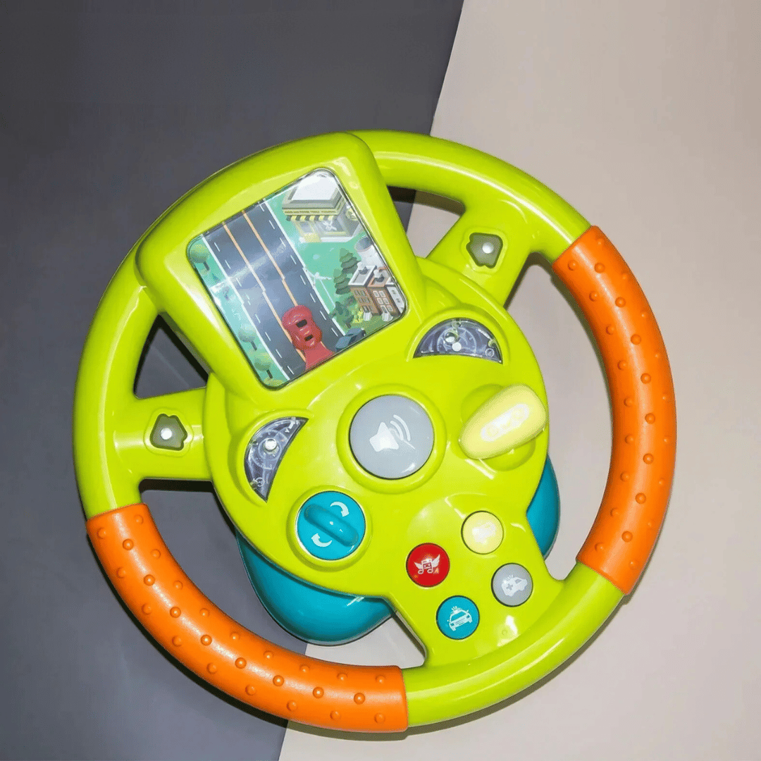 Toddler playtime activity toy: green and purple steering wheel with educational features.