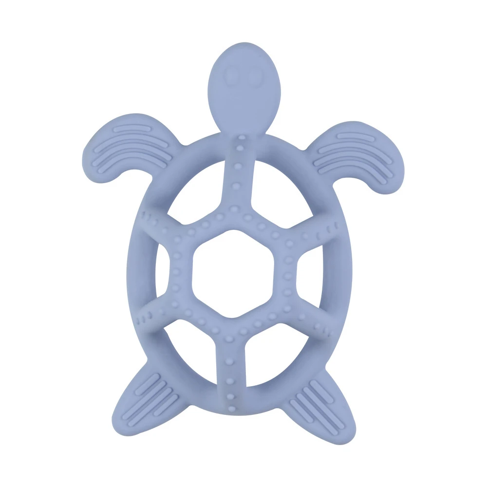 Happy infant exploring a soft silicone turtle teether, a perfect baby toy