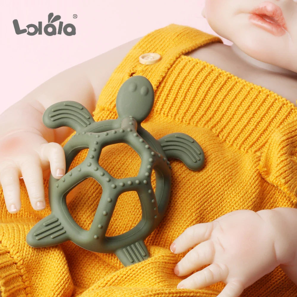 Close-up of a baby silicone turtle teether with textured surface for gum relief