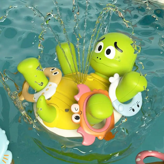 Green spinning turtle bath toy squirting water, perfect for infant and toddler sensory play in the tub.