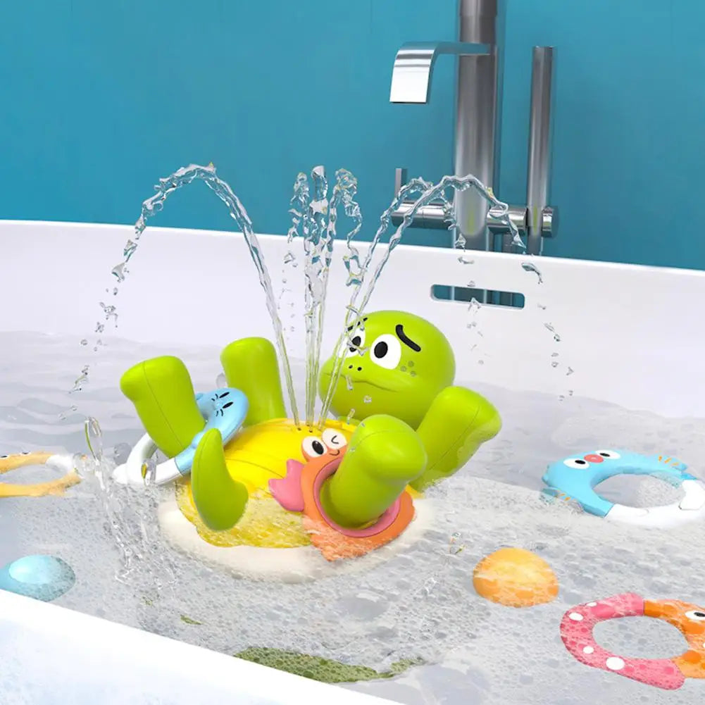 Close-up of a vibrant green turtle bath toy spinning and squirting water for infant bathing fun.