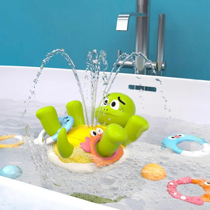 Close-up of a vibrant green turtle bath toy spinning and squirting water for infant bathing fun.