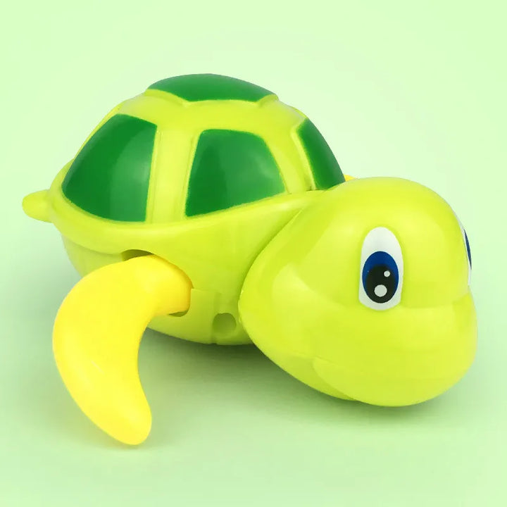 Wind-up swimming turtle bath toy demonstrating its swimming action in water, a dynamic kids water toy