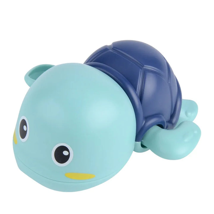 Three wind-up swimming turtle bath toys in different colors floating in water, engaging toddler toys