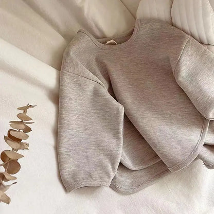 Soft grey kids' clothing unisex sweater, cotton blend for warmth and toddler fashion winter wear.