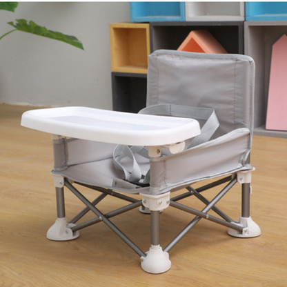 Grey toddler portable outdoor camping chair with safety lock, perfect for kids' camping adventures.