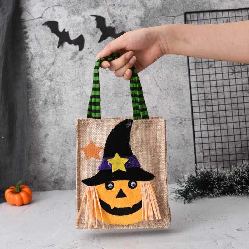 Linen drawstring bag for Halloween, featuring a fun monster illustration, ideal for candy collection