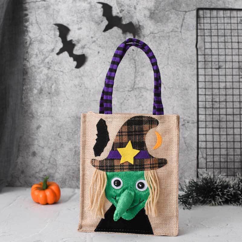 Small Halloween reusable linen bag with cute spiderweb pattern, perfect for little trick-or-treaters