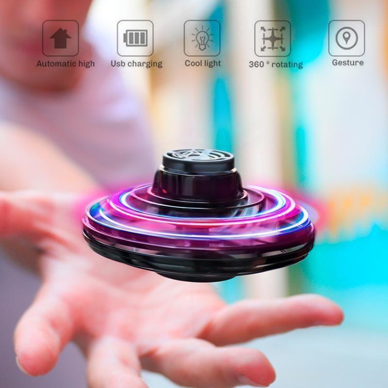 Hand controlled mini drone flying toy for kids, unisex, with LED lights for indoor fun.