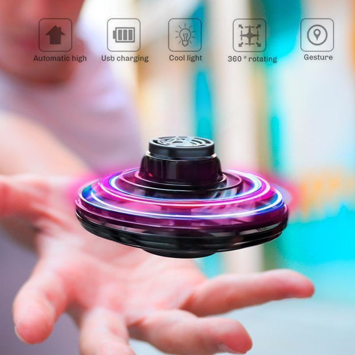 Hand controlled mini drone flying toy for kids, unisex, with LED lights for indoor fun.