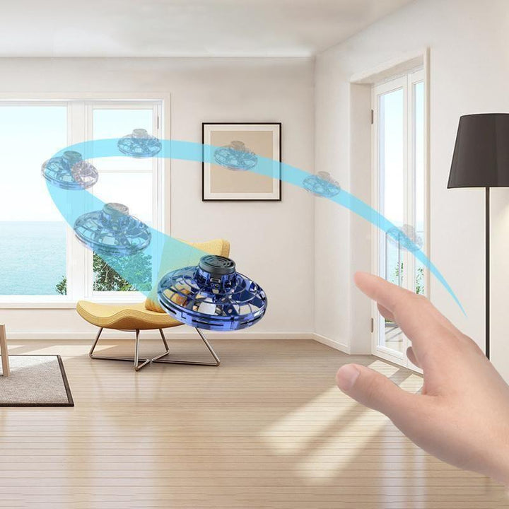 Fun gift: Hand controlled mini drone flying toy with LED lights, rechargeable for interactive kids' play.