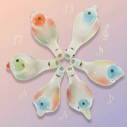 Educational ceramic bird water whistle toy with vibrant colors, offering musical play and sensory stimulation.