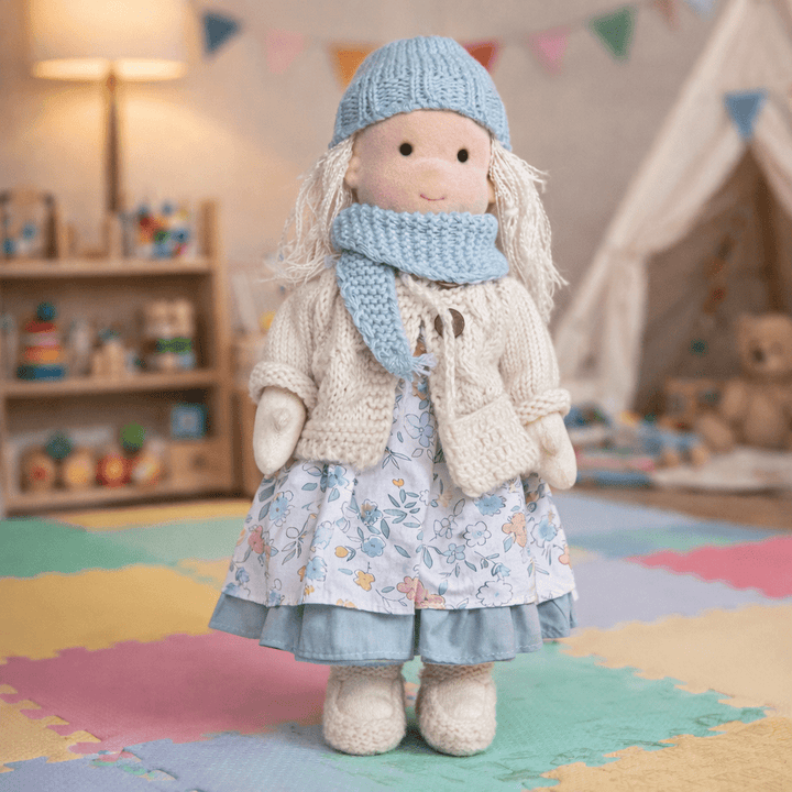 Handcrafted cotton Waldorf doll, a soft plush toy for kids' imaginative play.