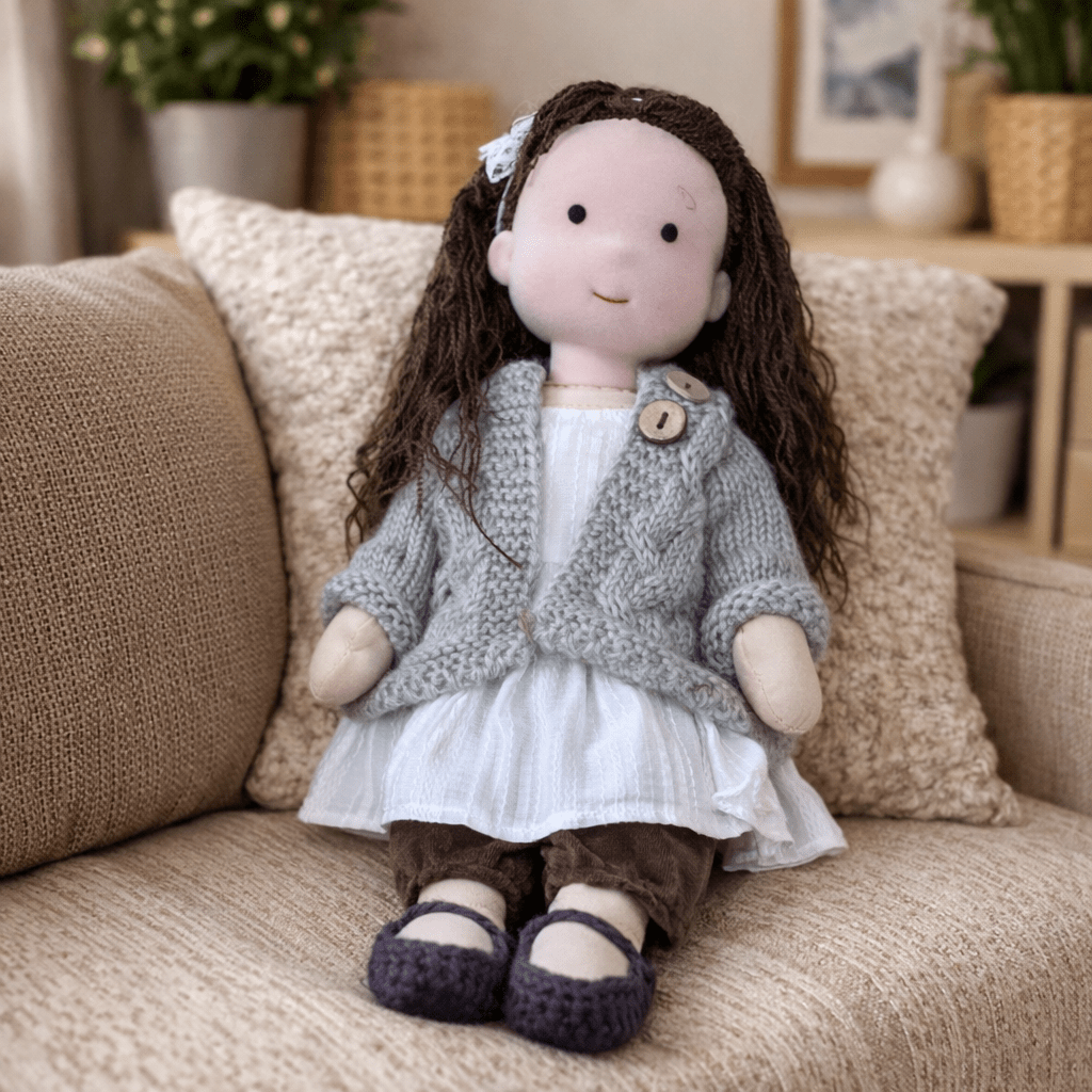 Waldorf doll with character, a handmade cotton plush toy fostering imaginative growth.