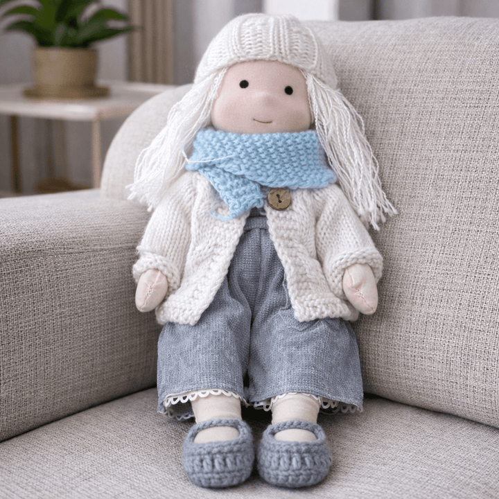 Soft cotton Waldorf doll for children, a developmental toy promoting imaginative play.