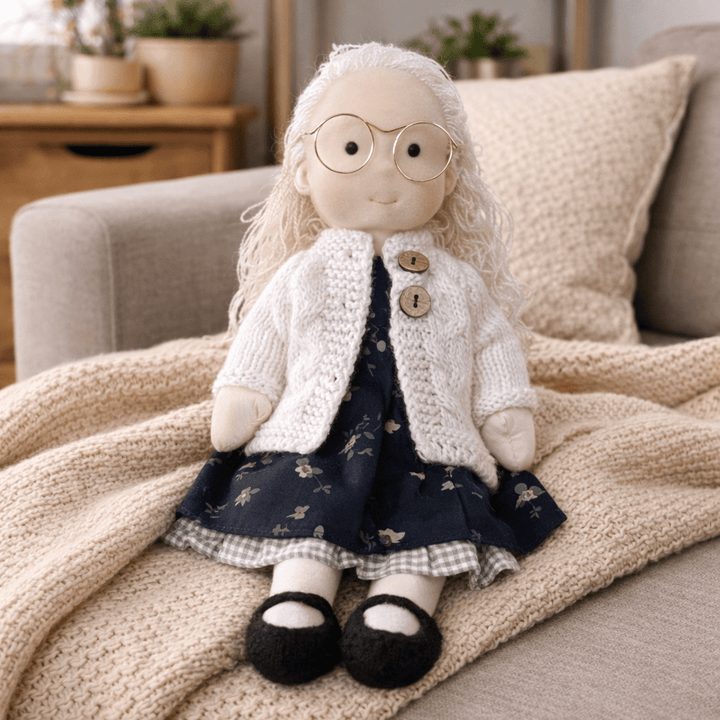 Handmade cotton Waldorf doll, ideal for creative play and a warm kids' gift.