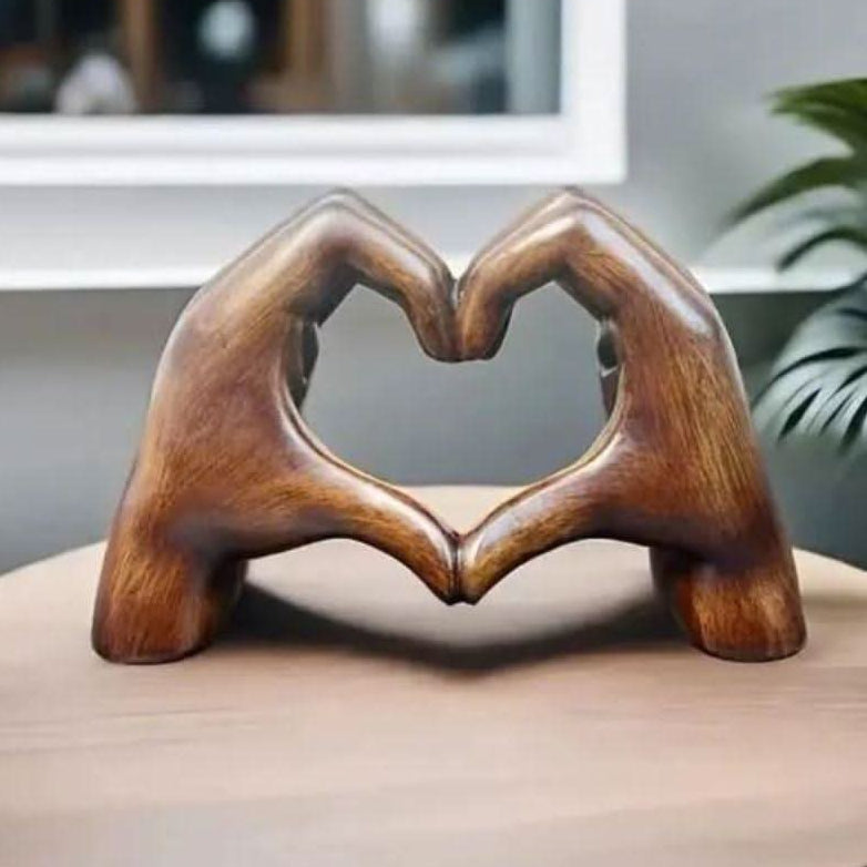 Artisanal handcrafted wood sculpture of heart hands, perfect modern home decor. Unique love symbol gift.