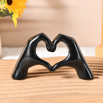 Modern home decor: handcrafted wood heart hands sculpture. Rustic charm, unique love symbol figurine.