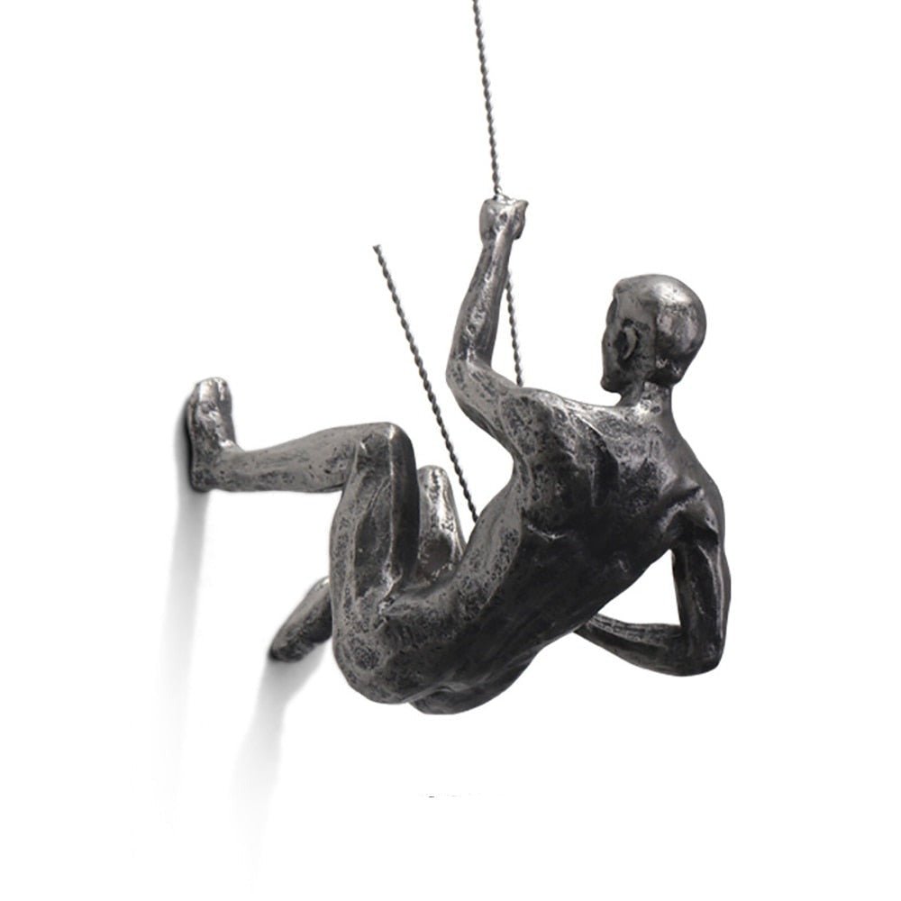 Minimalist climber wall art sculpture, handcrafted for modern interior design.
