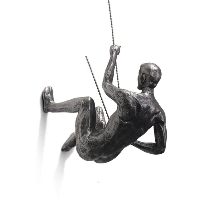 Minimalist climber wall art sculpture, handcrafted for modern interior design.