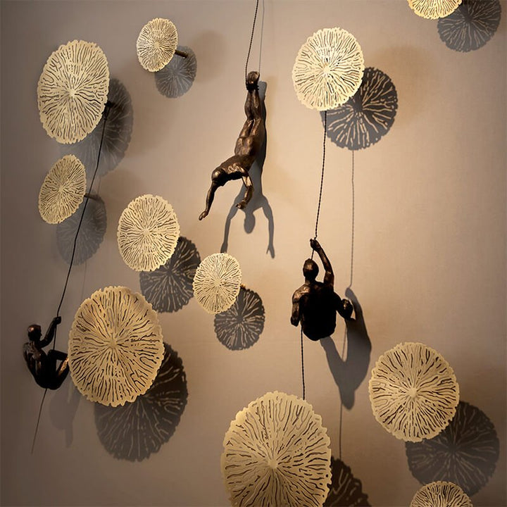 Aspirational climber wall art, handmade decorative sculpture for home or office.