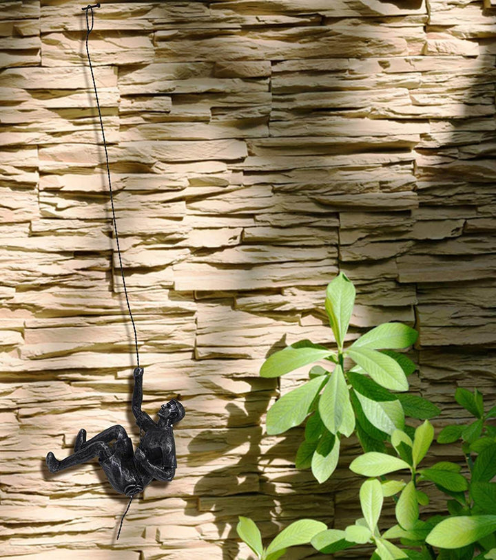 Artistic decorative climber figure, handmade wall sculpture for contemporary homes.