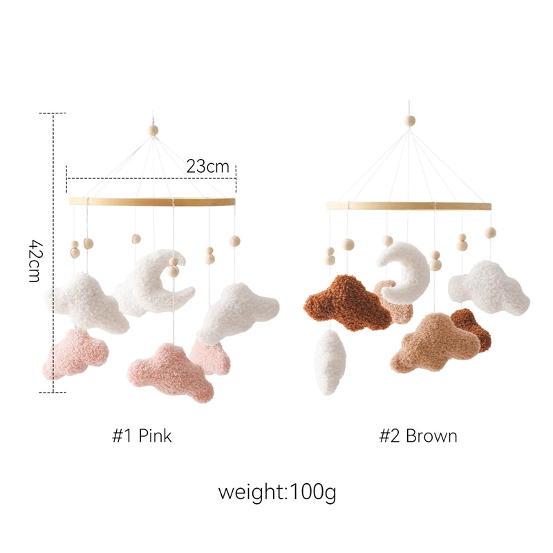 Modern cloud mobile for baby cribs, offering a minimalist yet playful touch to nursery room decor.