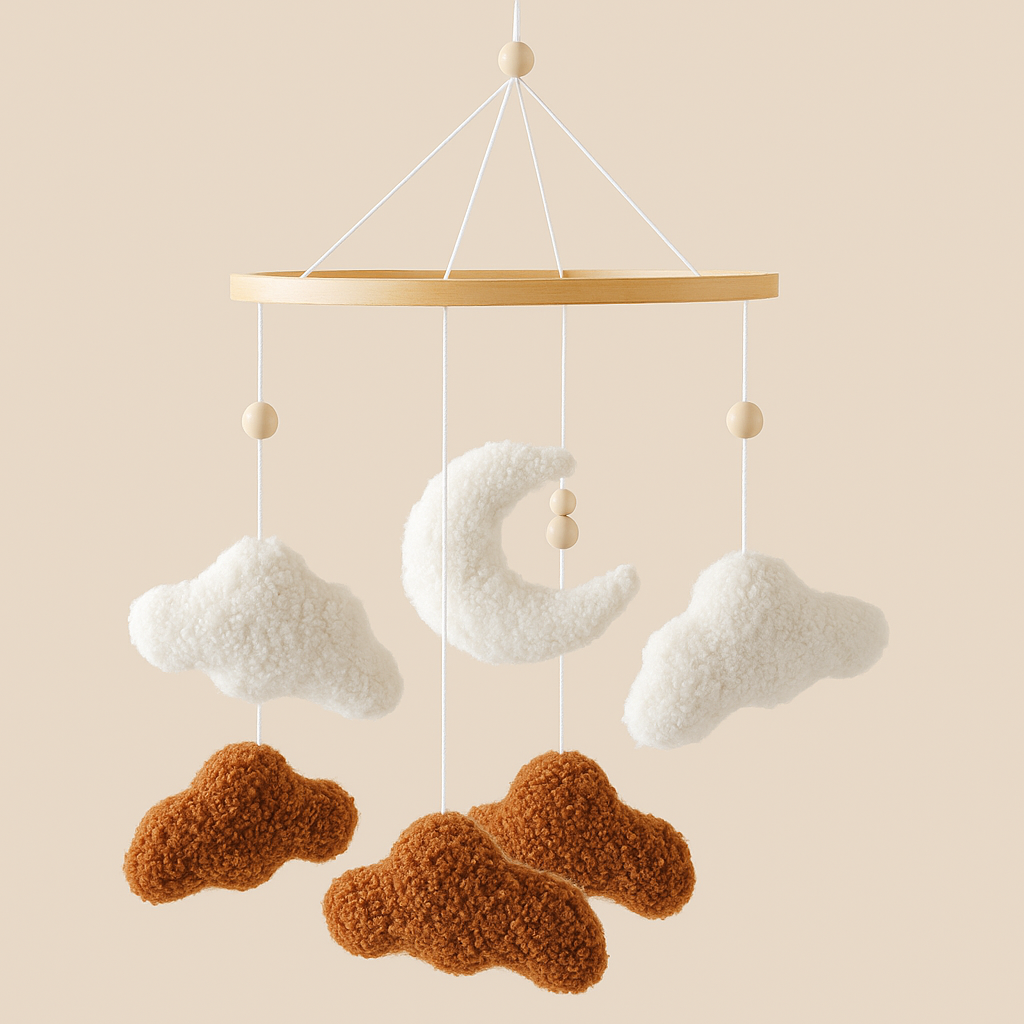 Detailed view of a soft felt cloud from a baby mobile, a high-quality accessory for infant play.