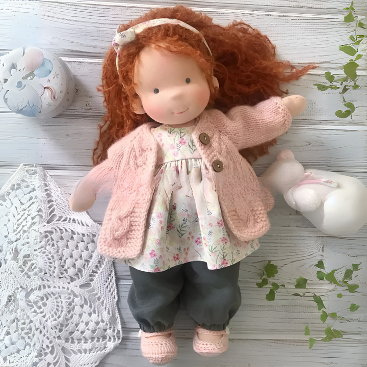 Handmade Waldorf doll for imaginative play, soft, natural design.
