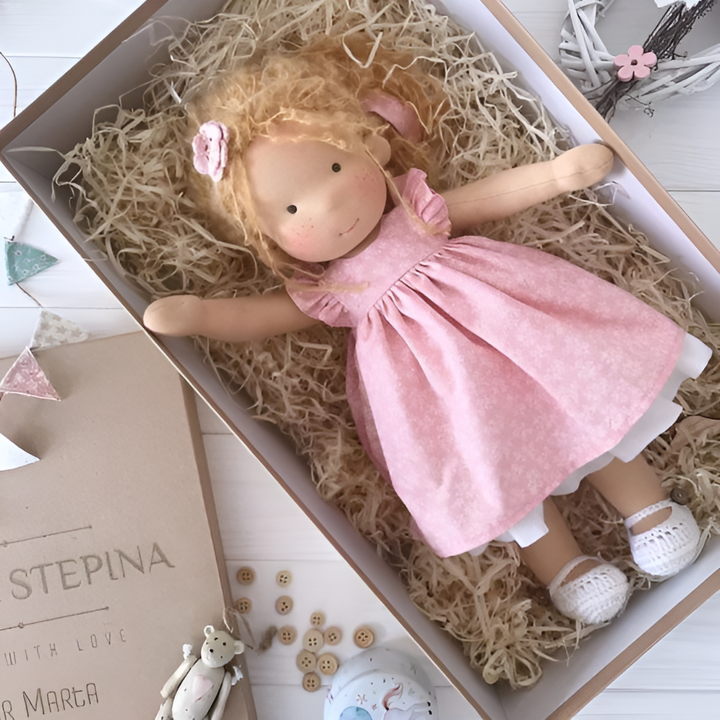 Soft Waldorf doll for imaginative play, promoting creative growth.