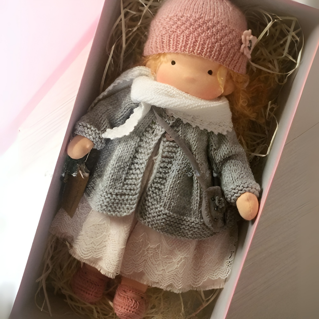 Soft Waldorf doll, handmade from natural materials, perfect gift.