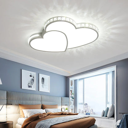 Heart-shaped LED ceiling light with crystal accents, perfect for a kids' room or nursery, cool white.
