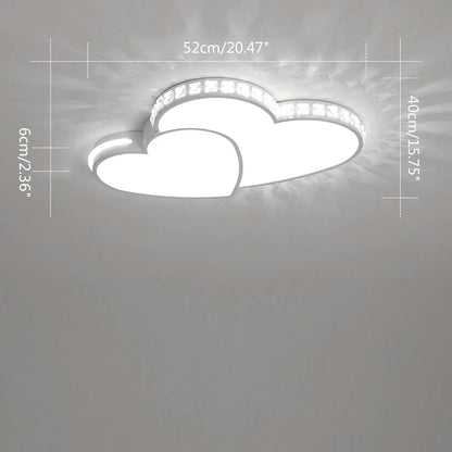 Decorative heart-shaped LED ceiling fixture with sparkling crystals, a charming nursery lamp.