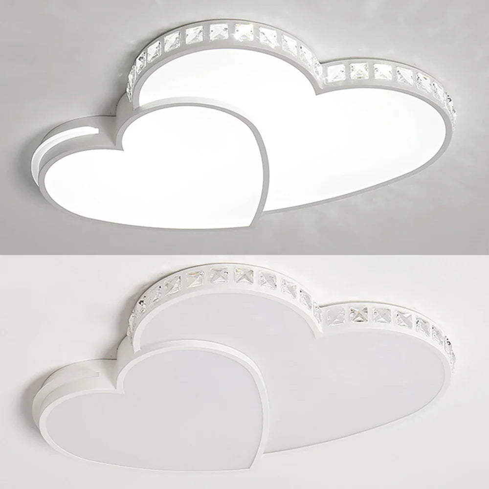 Cool white LED ceiling light in a heart shape, crystal details add elegance to kids' bedroom lighting.