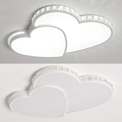 Cool white LED ceiling light in a heart shape, crystal details add elegance to kids' bedroom lighting.