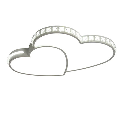 Contemporary heart design LED ceiling light with crystal elements, flush mount for kids' rooms.