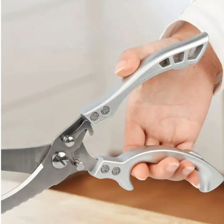 Ergonomic heavy-duty kitchen shears for comfortable, precise cutting of poultry & other foods.