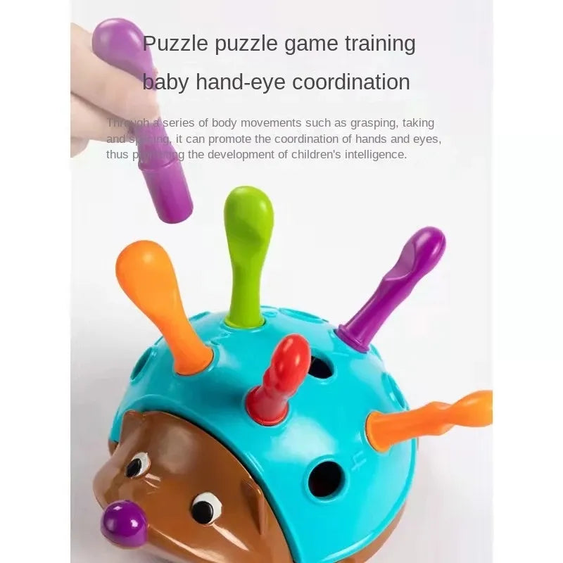 Toddler playing with hedgehog montessori toy, focusing on inserting colored pegs into holes