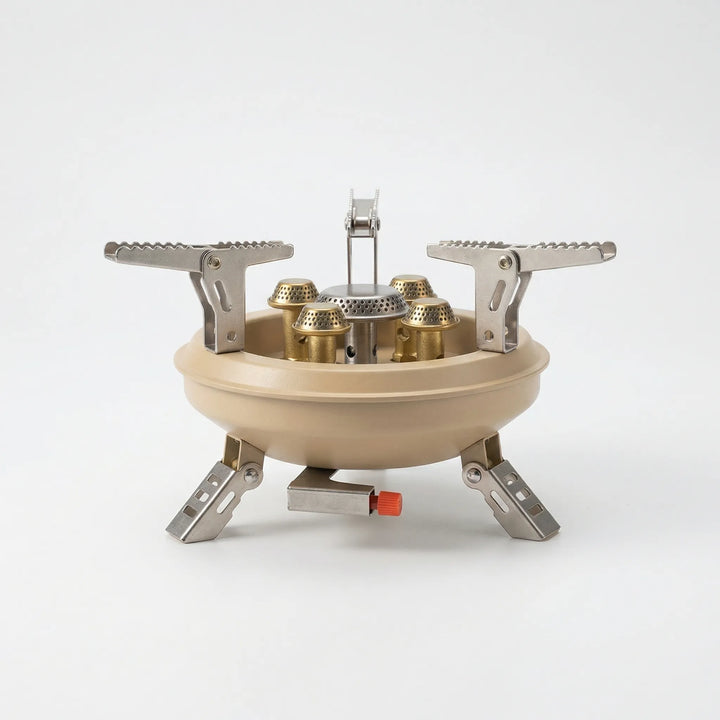 Compact backpacking stove with integrated windshield, ideal for camp cooking and outdoor adventures. Portable burner.