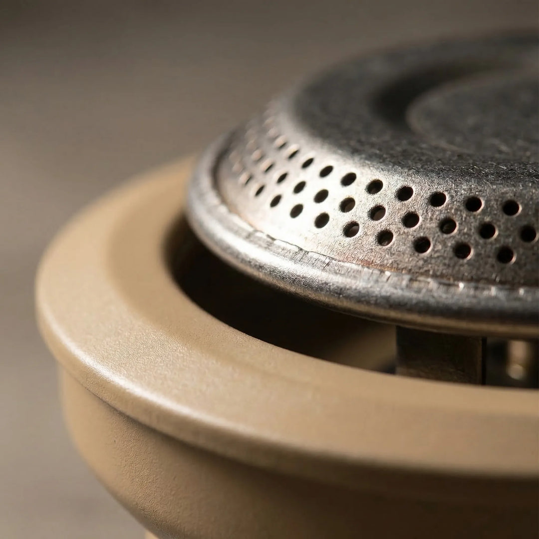 Windproof high-output camping stove, an essential outdoor burner for efficient camp cooking and travel.